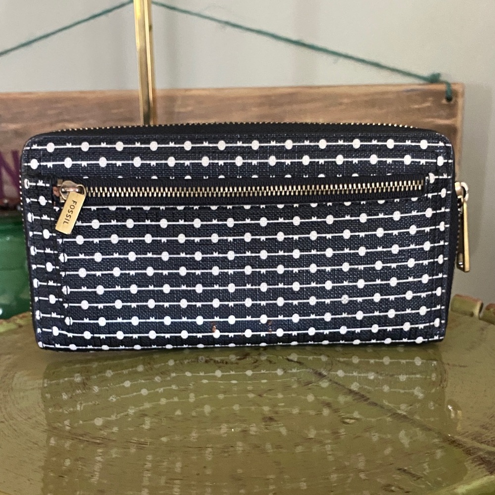 Fossil Logan RFID Zip Around Clutch in a black and white dotted pattern